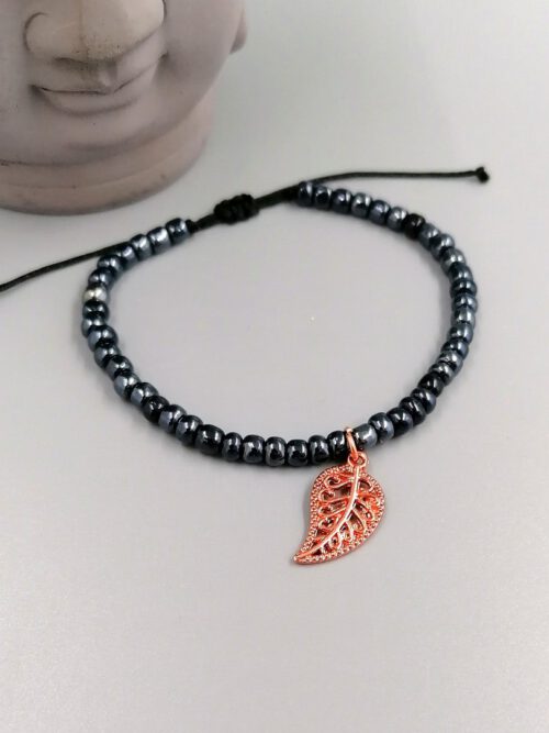 Schwarzes Rocailles-Armband mit rosegold Blatt-Anhänger Armband Blättchen - schwarz, rosegold