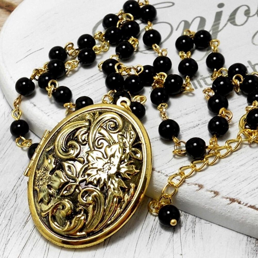 Perlenkette mit Medaillon gold-schwarz