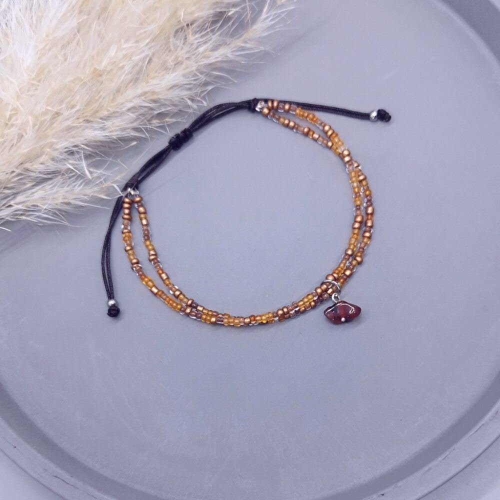 armband-mit-anhänger-aus-karneol-splitterperle-auf-935-silber Armband orange-kupfer mit Karneol