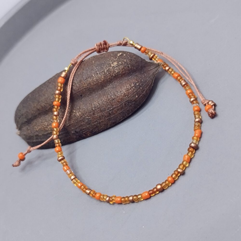 handgefertigtes-armband-orange-gelb-gold-kupfer Armband orange-gold-kupfer