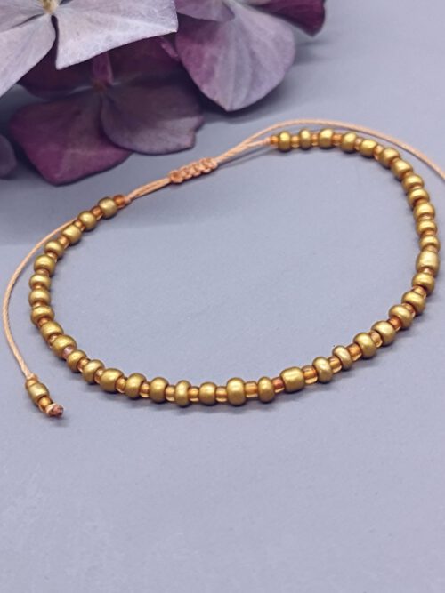 Armband gold-orangene Rocailles