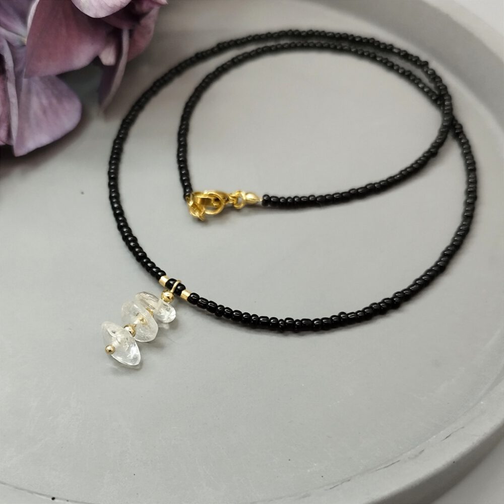 Kette Bergkristall schwarz-gold