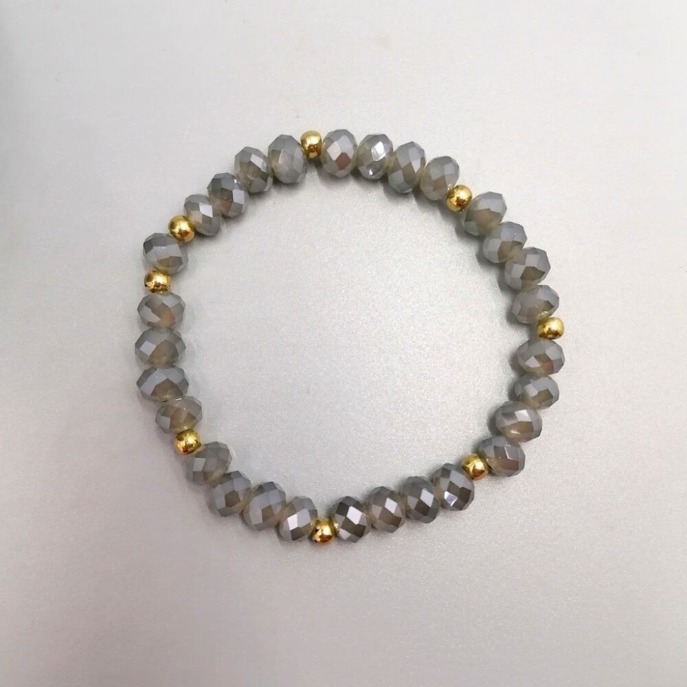Graues Kristallarmband mit Goldakzenten