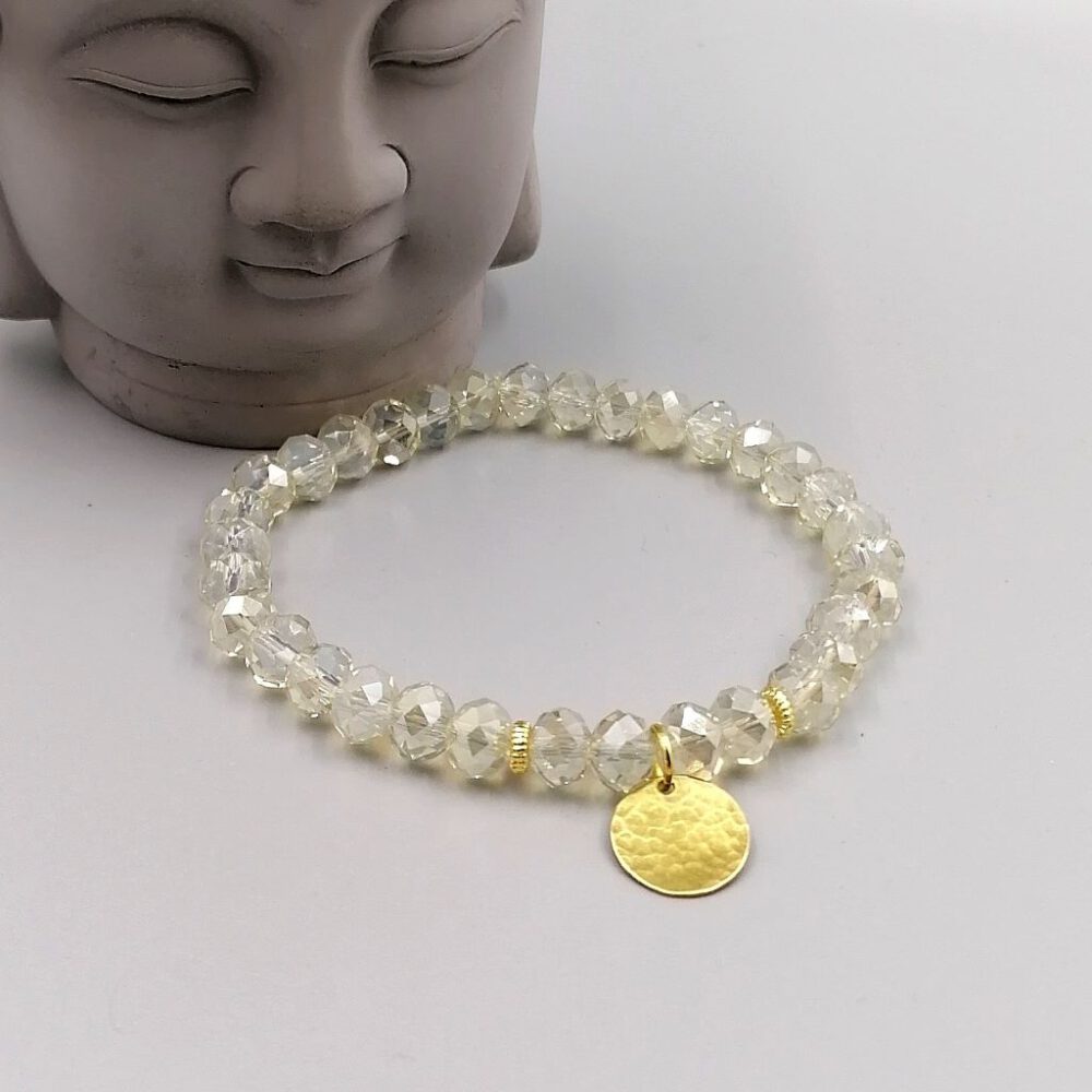 Kristallarmband mit vergoldeten Spacern und Messing-Anhänger Kristallarmband-mit-vergoldeten-Spacern-und-Messing-Anhaenger
