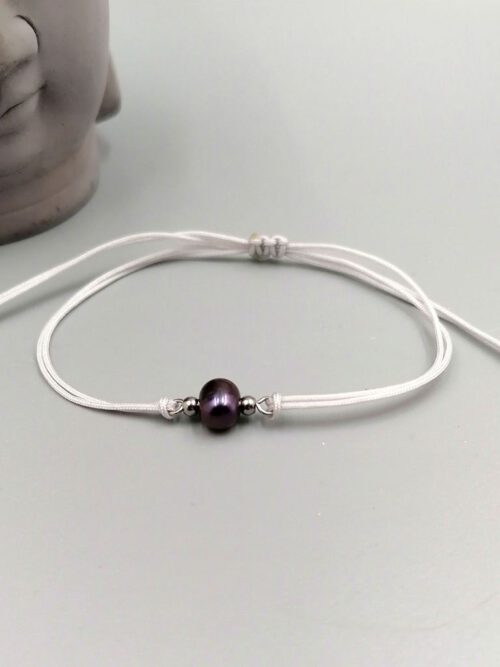 Zartes Nylon-Armband mit lila Süßwasserperle Armband lila Süsswasserperle