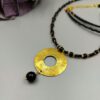 Lange Perlen Kette Onyx & Gold