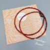 Kette aus Rocailles in Kupfer & Orange