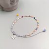 Buntes Boho Armband mit Herzanhänger