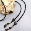 Handgefertigte Brillenkette Schwarz-Gold