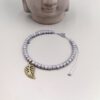 Graues Rocailles-Armband mit bronze Blatt