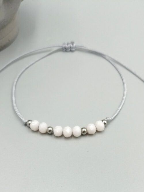 Textilarmband mit rosa Kristallperlen
