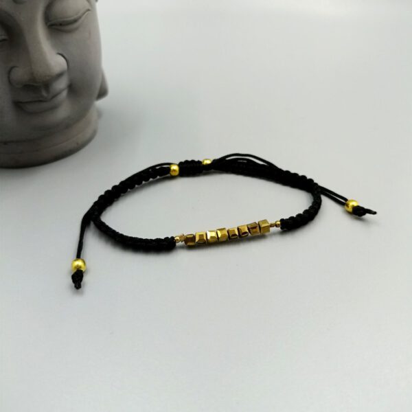 Handgeknüpftes Armband mit goldfarbenen Glaskristallen Armband schwarz gold mit Kristallperlen