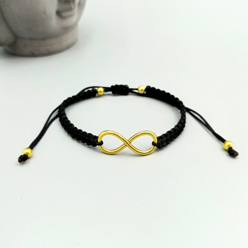 Infinity Armband Makramee schwarz gold