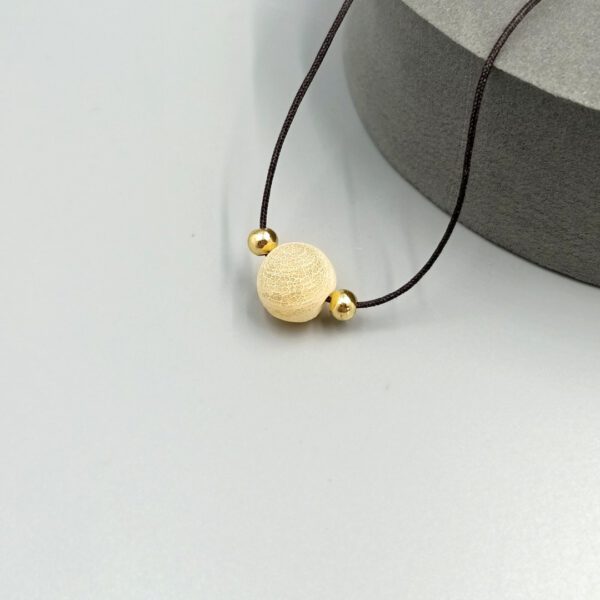 Verstellbare Nylonkette mit gelbem Achat