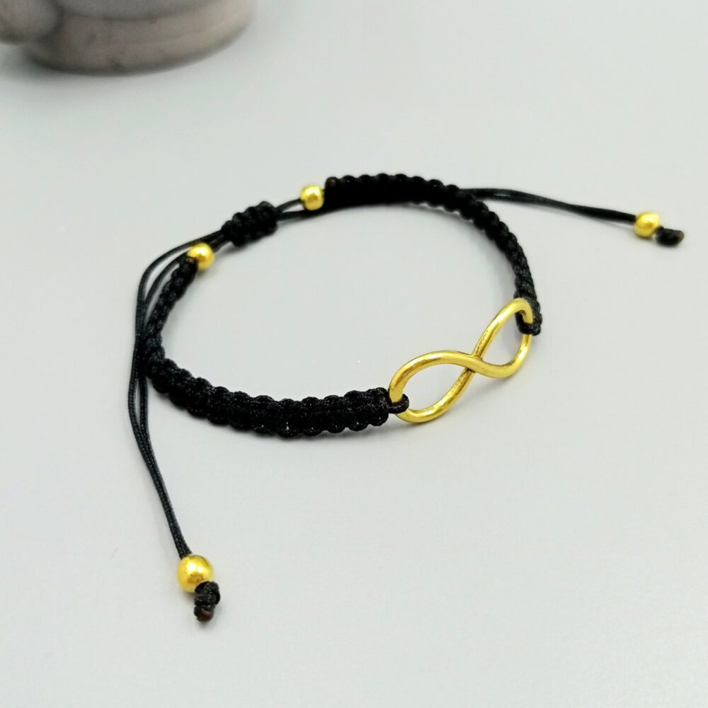 Schwarzes Armband mit Unendlichkeitssymbol in Gold Infinity Armband Makramee schwarz gold