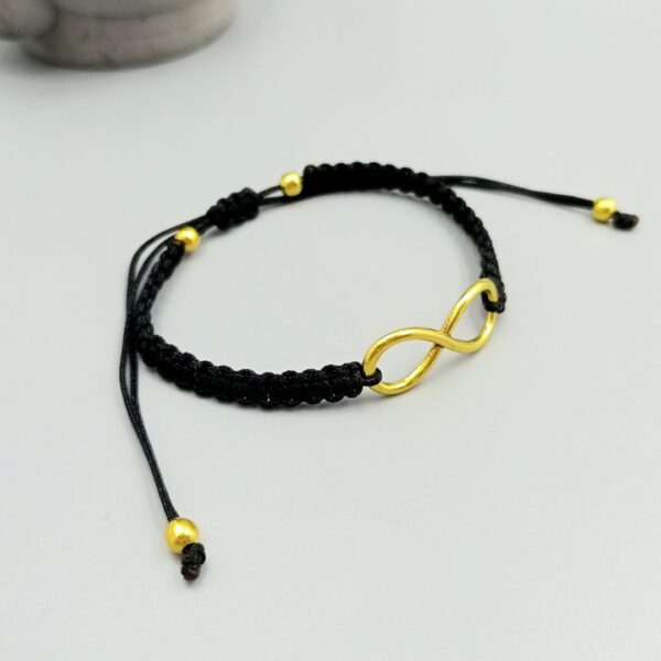 Schwarzes Armband mit Unendlichkeitssymbol in Gold Infinity Armband Makramee schwarz gold