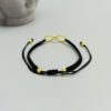 Verstellbares Makramee Armband mit Infinity Symbol Infinity Armband Makramee schwarz gold