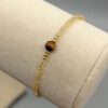 Goldenes Rocailles-Armband mit Tigerauge